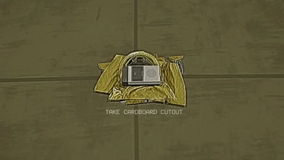 The folded Cardboard Cutout with a cassette player on top and the Take Cardboard Cutout prompt