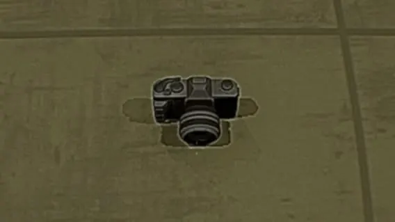 The Camera on the floor, a compact film-style camera