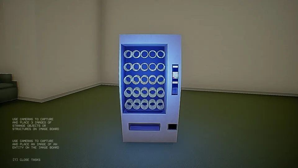 A lit blue vending machine standing alone in a pale room with green carpet