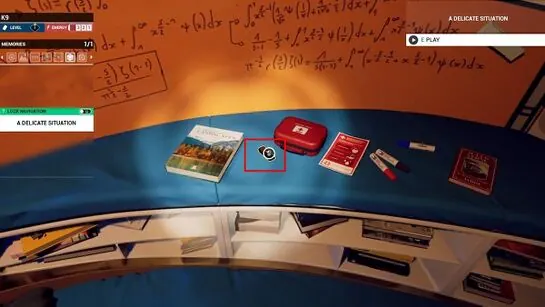 The first battery outlined in red on the lounge counter below the equations board