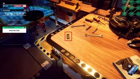The second battery outlined on the Robot Area workbench among scattered tools