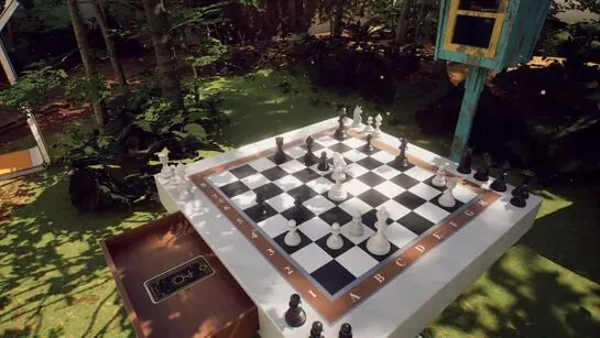 The Greenhouse chess board with its drawer open and a Tarot Card inside