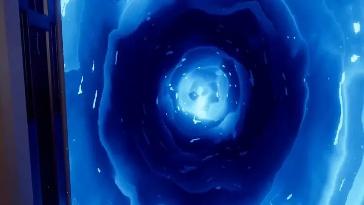 The blue portal filling Jonny's doorway