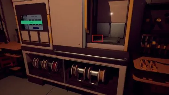 The Garage manufacturing machine with its output tray outlined