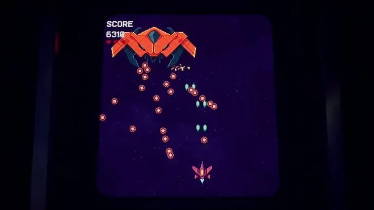 The arcade minigame boss firing a spread of shots at the player's ship