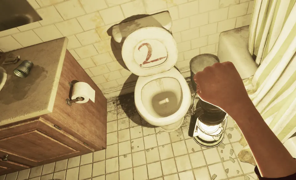 The bathroom toilet with a red 2 painted on the lid, meaning two more medicine bottles still need flushing